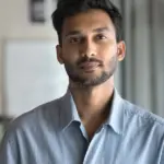 serious attractive indian man posing vertical head shot serious attractive indian man posing vertical head shot front 312861983